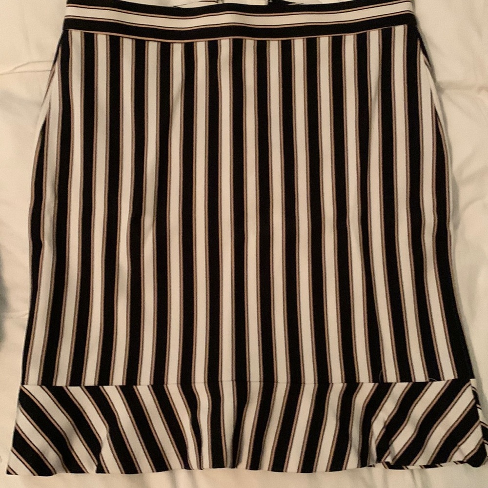 Check out my closet for a blue blouse and/or pants that coordinates.
